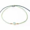 JEWELRY TAI BEADED BRACELET W/CRACK CRYSTAL CENTER