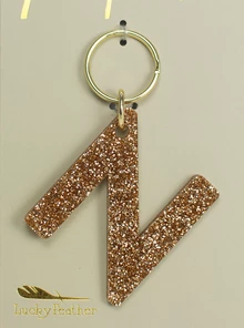 LUCKY FEATHER GLITTER LETTER KEYCHAIN