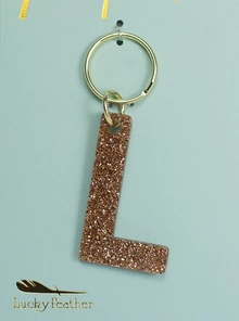 LUCKY FEATHER GLITTER LETTER KEYCHAIN