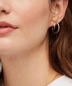 ESTELLA BARTLETT PAVE SET LARGE HOOP EARRINGS
