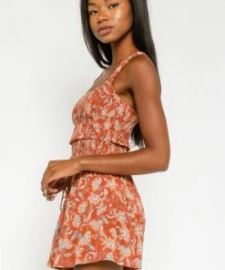 NEW ARRIVALS OLIVACEOUS RUSTY FLORAL SMOCKED TANK