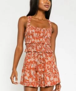 NEW ARRIVALS OLIVACEOUS RUSTY FLORAL SMOCKED TANK